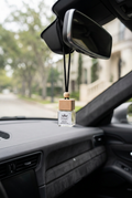 Toasted Marshmallow diffuser on a rearview mirror